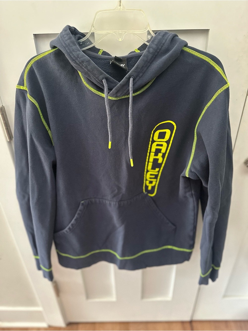Oakley youth Navy Hoodie with Neon Yellow Logo and Stitching
